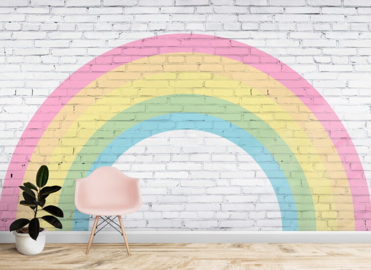 white wall stones on soft colorful rainbow wallpaper
