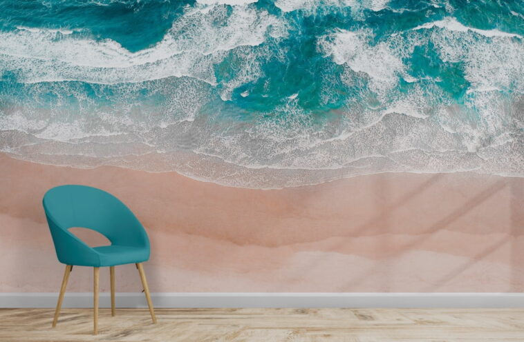 sandy beach and wavy sea view wallpaper